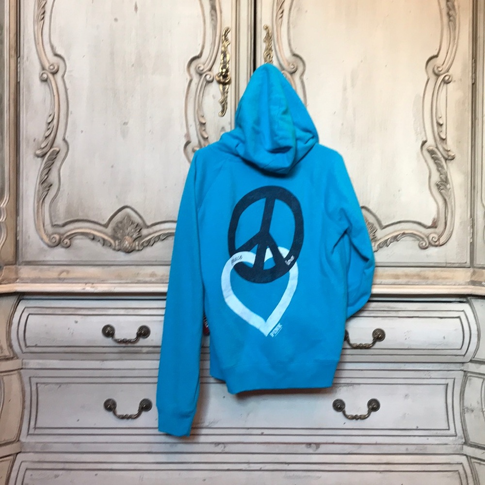 Turquoise Victoria’s Secret PINK full zip hoodie.